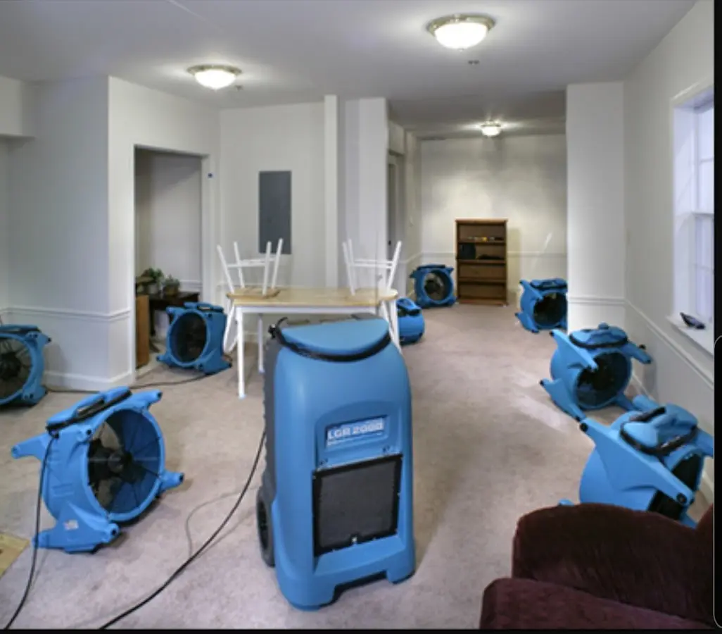 Air movers and dehumidifier setup for Water Damage Restoration in New Philadelphia